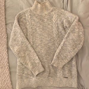 Lightly worn Abercrombie sweater with button up back